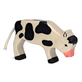 Calf, grazing, black