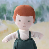 Charlie in Natural Shirt and River Green Linen Overalls